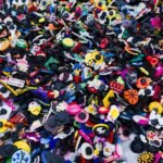 a pile of different colored and shaped buttons